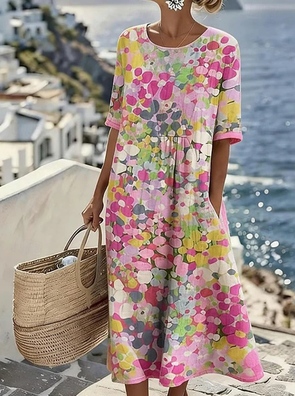 Flowy bohemian floral maxi dress for women, a stylish long casual summer dress perfect for relaxed vacation looks.