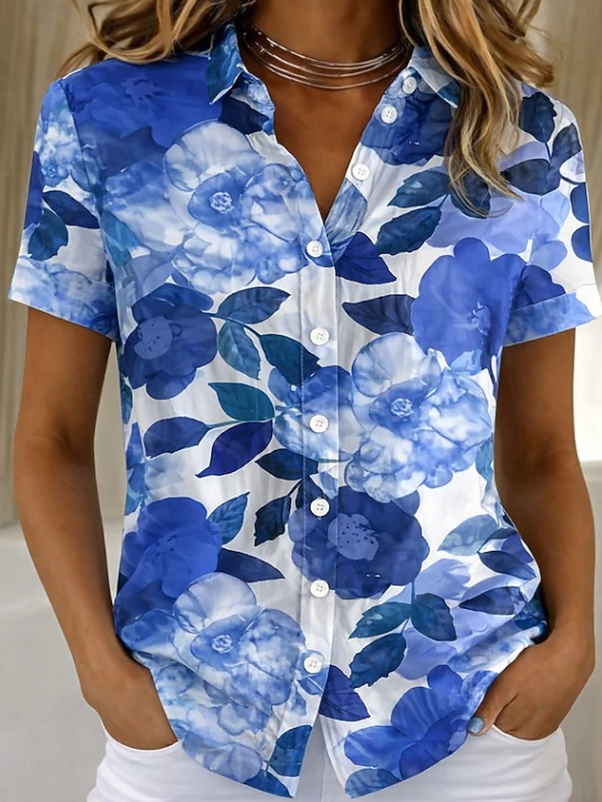 Women's short sleeve floral button-up shirt in a relaxed fit, a must-have casual spring blouse.