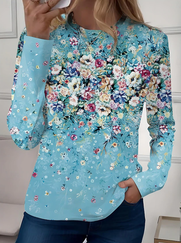 Comfortable women's long sleeve crew neck shirt with a stylish floral print, versatile for casual everyday outfits.