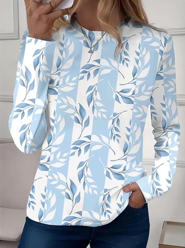 Chic women's long sleeve floral crew neck shirt, ideal casual blouse for effortless everyday style in spring/fall.