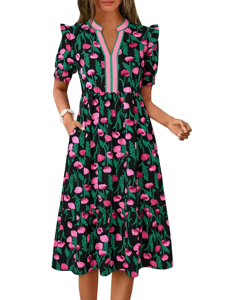 Flowy tiered floral midi dress for women, offering a relaxed fit; ideal for casual elegance & comfort.