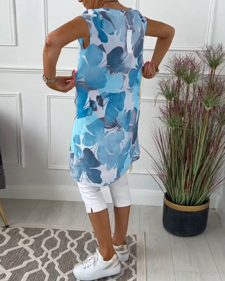 Elegant women's casual dress with a vibrant floral pattern, knee-length.
