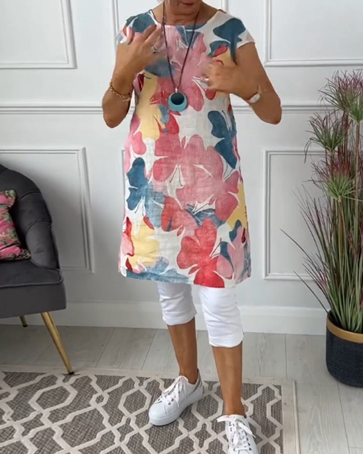 Relaxed fit floral summer dress for women, perfect for comfortable everyday wear.
