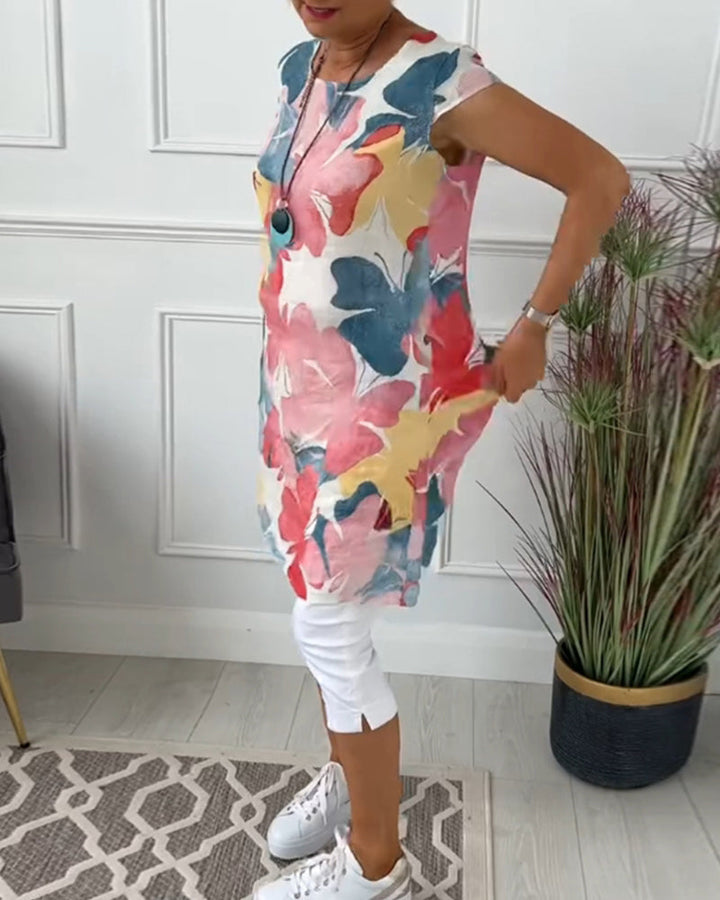 Knee-length floral print dress for women, offering a relaxed and comfortable fit.
