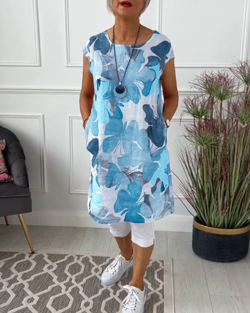 Pretty floral print women's dress, knee-length, designed for casual comfort.