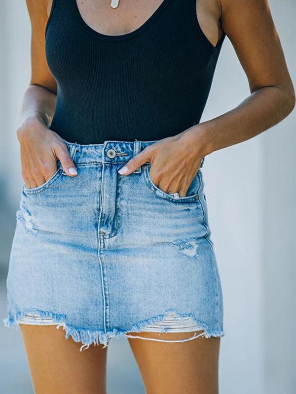 Women's casual frayed denim mini skirt in classic blue for everyday wear.
