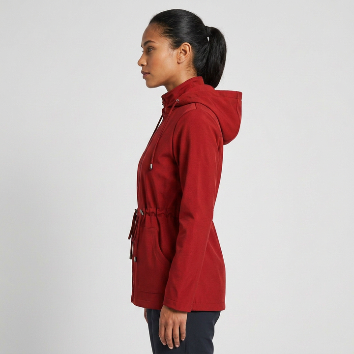 Stylish women's zip-up hooded jacket, perfect for transitional seasons. Casual drawstring waist coat.