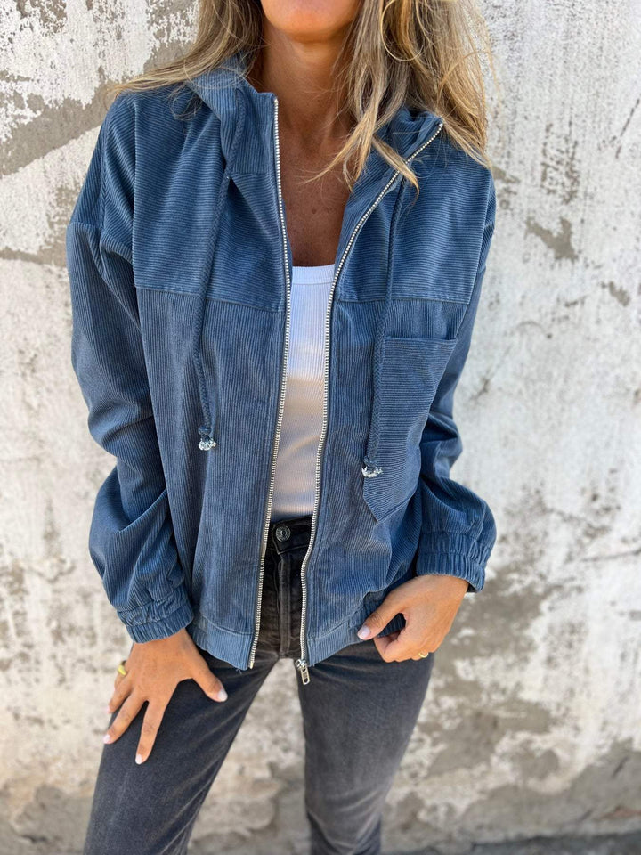 Women's casual hooded zip-up jacket in a neutral color, perfect for everyday wear and effortless style.