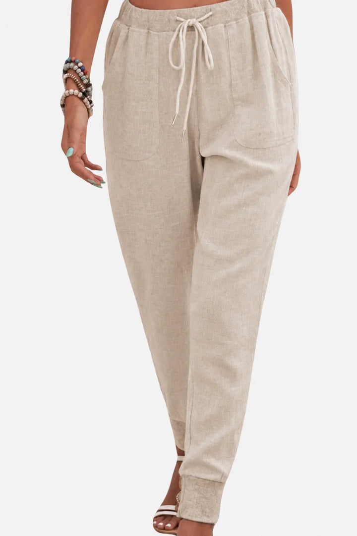 Women's casual jogger pants with drawstring waist & elastic cuffs. Perfect for everyday relaxed style and comfort.