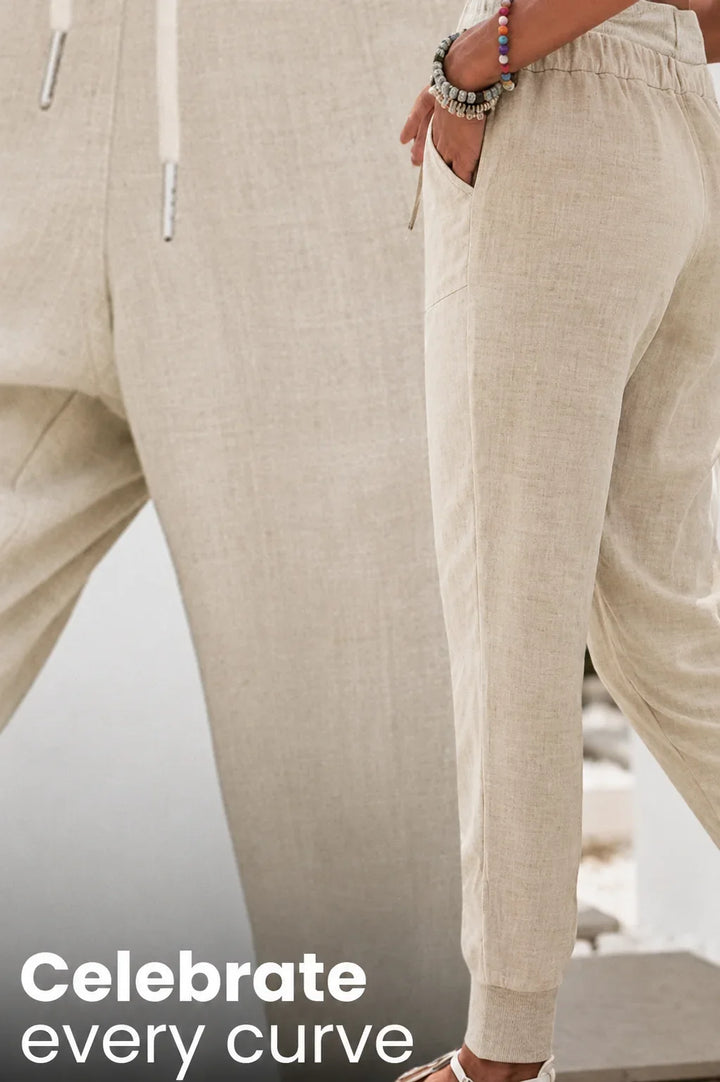Comfortable women's jogger pants, relaxed fit with adjustable drawstring and ribbed cuffs for versatile casual wear.