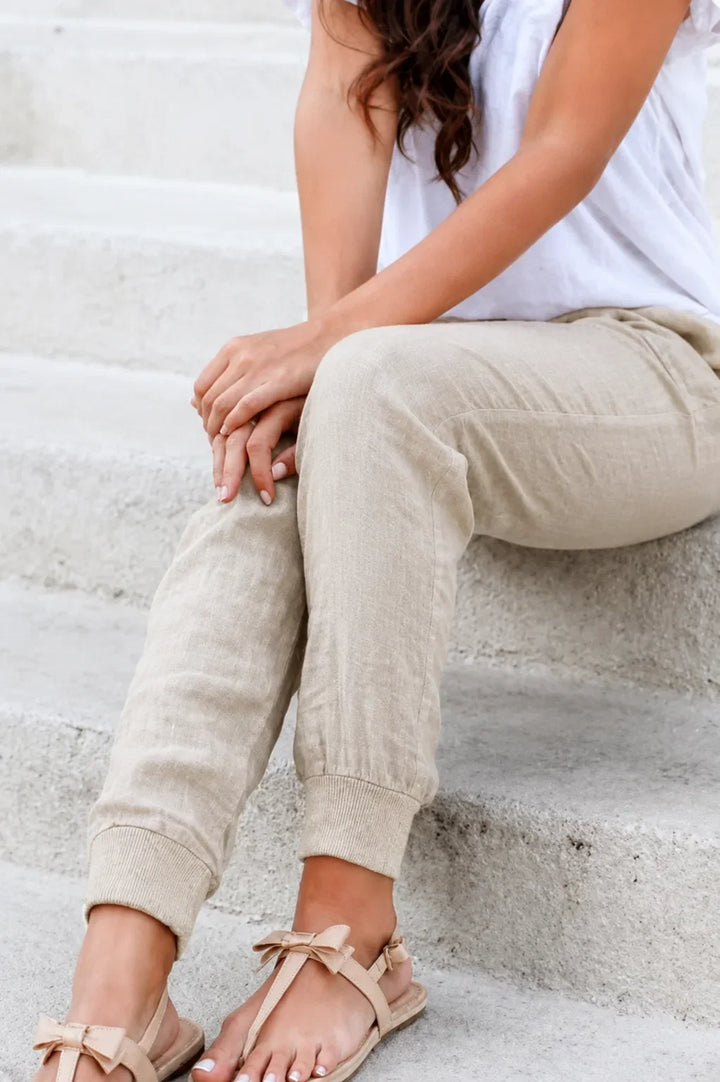 Relaxed fit women's jogger pants with a comfortable drawstring waist and stylish elastic cuffs. Perfect for daily wear.