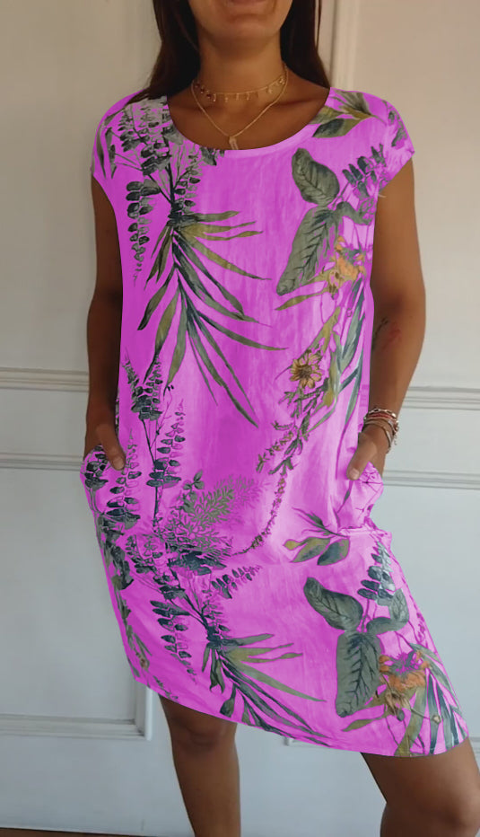 Stylish women's leaf print pocket dress, a comfortable midi summer style with short sleeves and a flattering V-neck design.
