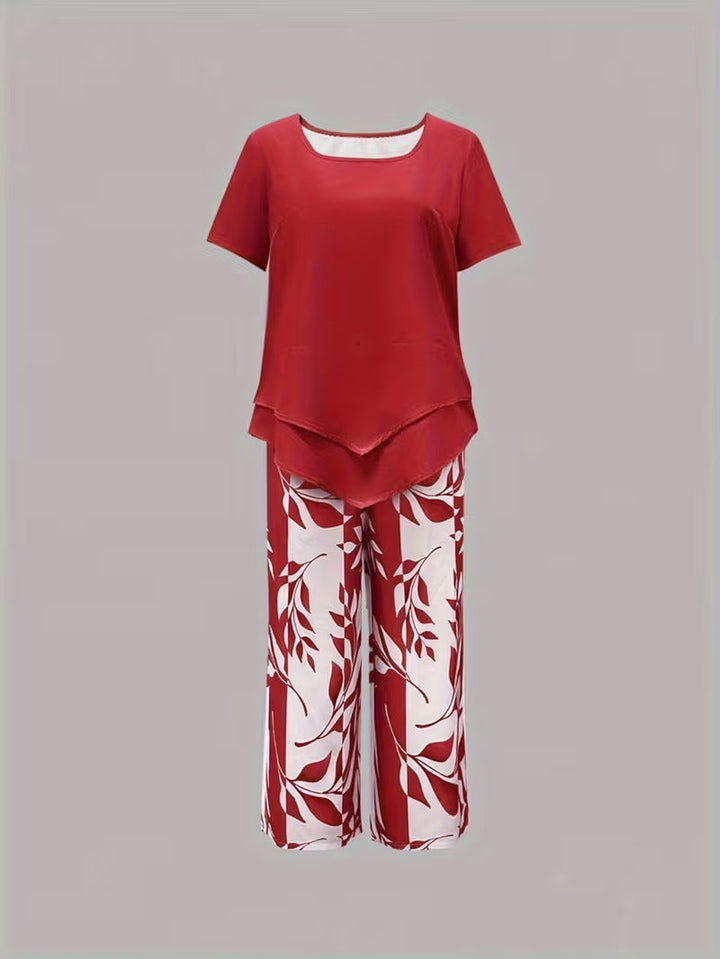 Women's vacation-ready leaf print two-piece set, offering stylish comfort & relaxed fit.
