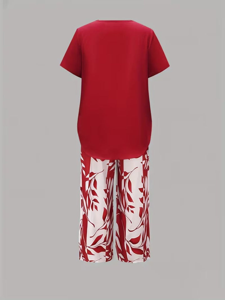 Casual women's leaf print set: a comfortable two-piece outfit for summer and relaxed days.