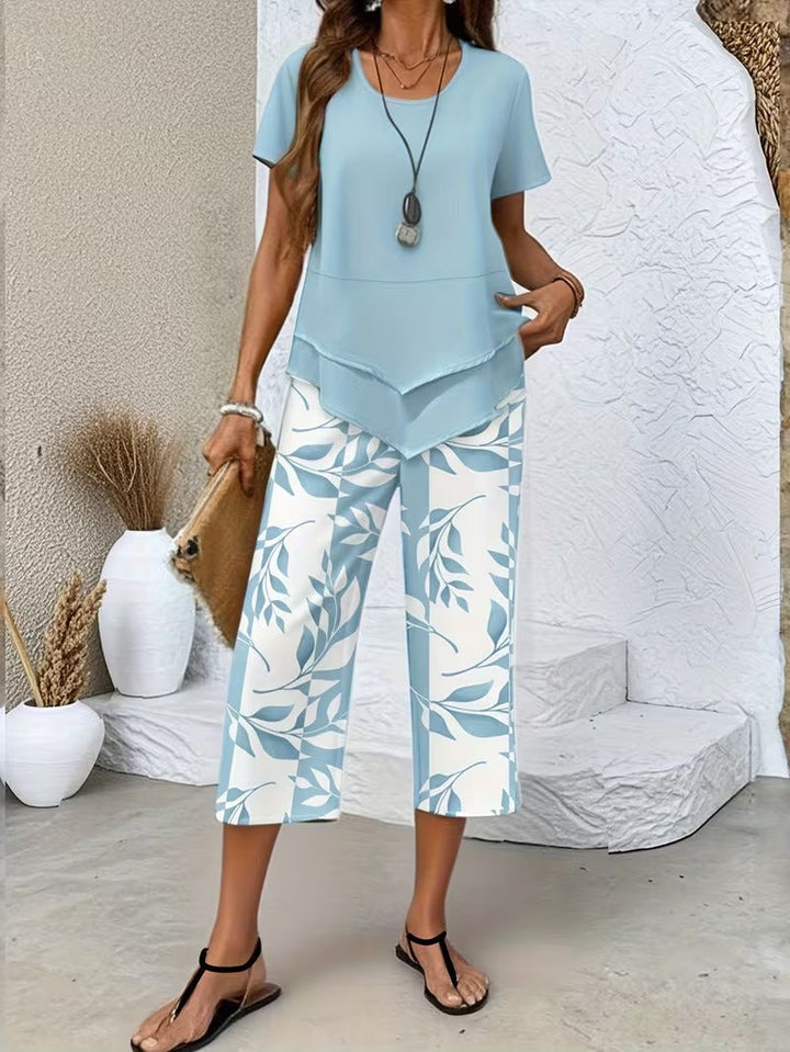 Comfortable women's leaf print two-piece lounge wear set with a relaxed fit.