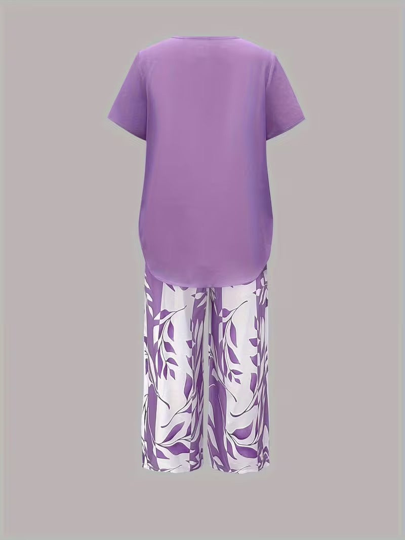 Women's casual leaf print two-piece ensemble. Perfect for a comfortable summer day or stylish loungewear.