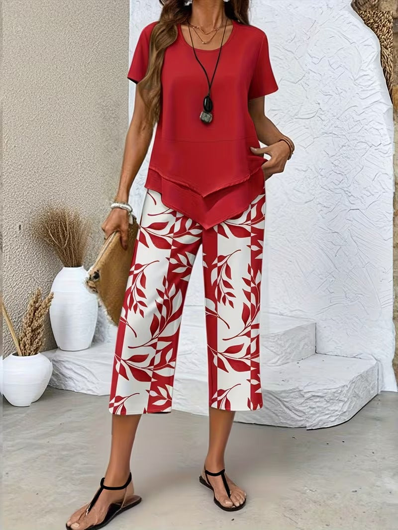 Relaxed fit women's two-piece set featuring a vibrant leaf print. Ideal for casual summer or resort wear.