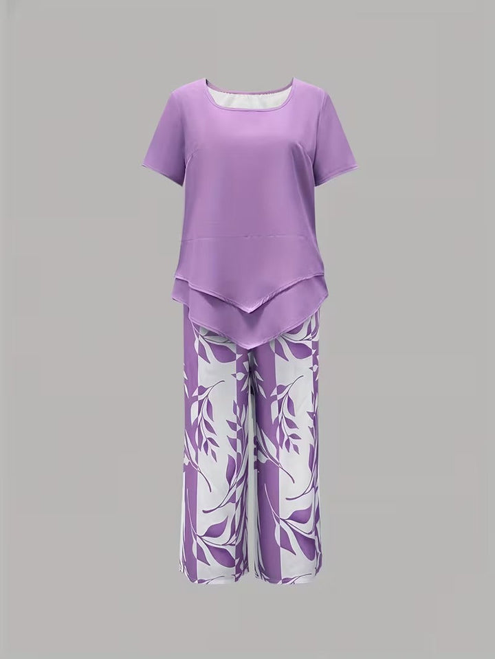 Vibrant leaf print two-piece set for women. Casual, comfortable, and stylish summer outfit or resort wear.