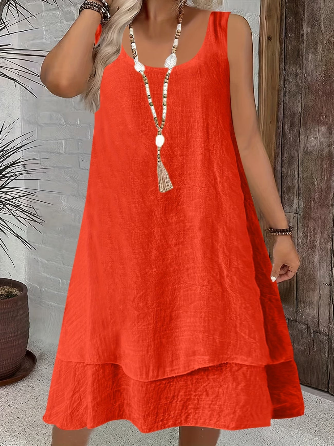 Women's casual loose sleeveless dress in a vibrant color, perfect for comfortable summer everyday wear.