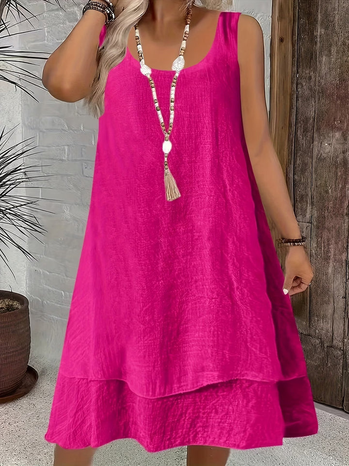Orange loose-fit sleeveless dress for women, offering effortless style & comfort for casual summer outings.