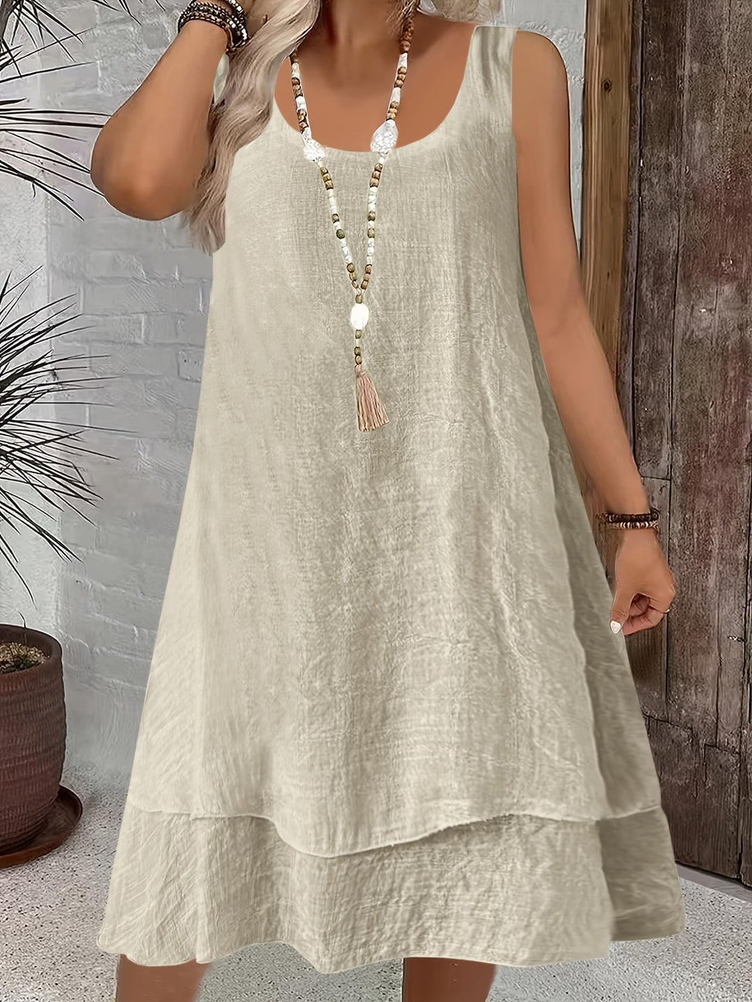 Black casual sleeveless dress with a loose, relaxed fit, ideal for women's everyday summer fashion.