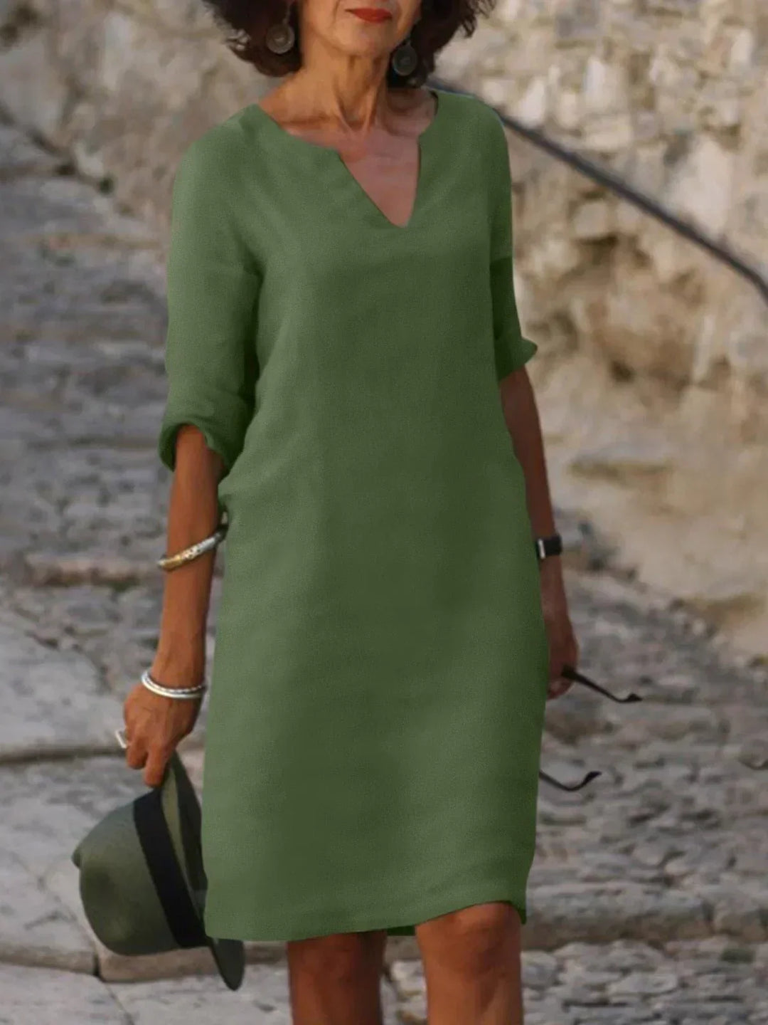 Versatile women's V-neck mid sleeve casual dress, an effortless style suitable for any occasion.