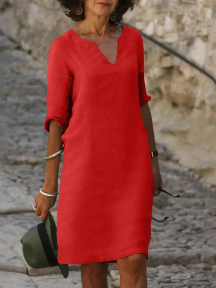 Elegant women's mid sleeve V-neck dress, ideal for both casual outings and special occasion wear.