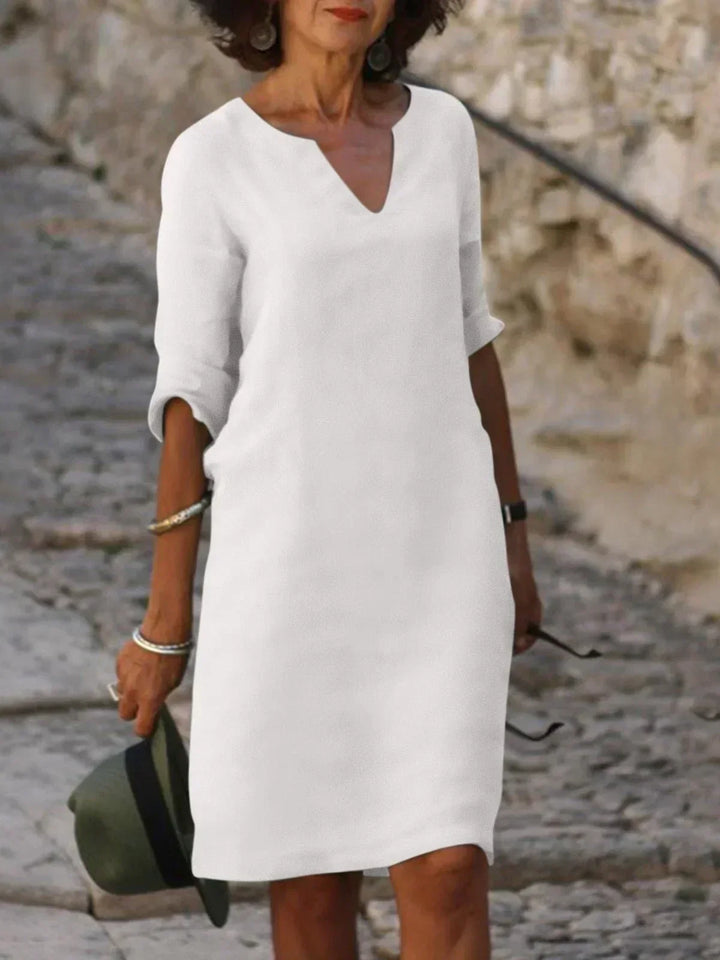 Stylish women's V-neck mid sleeve dress, a versatile piece for a flattering and elegant look.