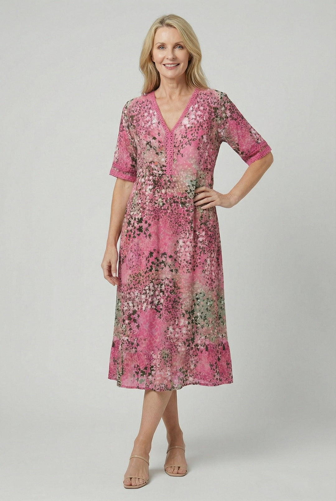 Midi length dress for women, showcasing a vibrant floral pattern