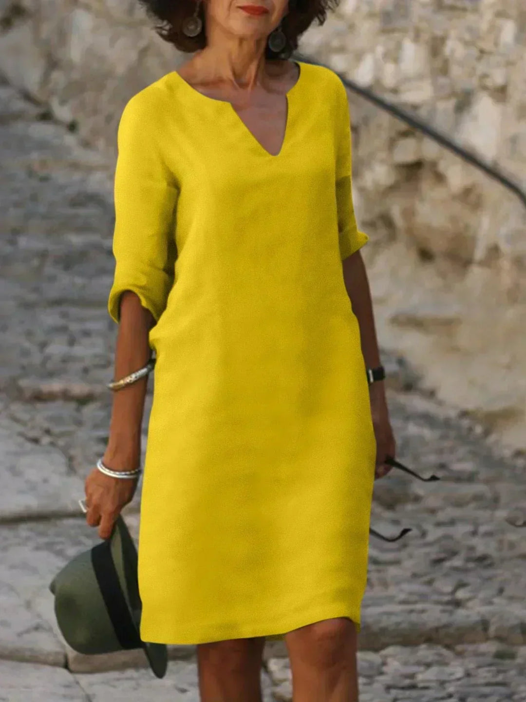 Comfy loose fit women's mini dress, 3/4 sleeves, V-neck, great for casual summer outings.