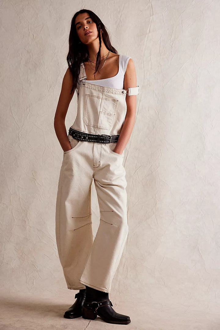 Close-up of women's casual overalls showing durable denim fabric
