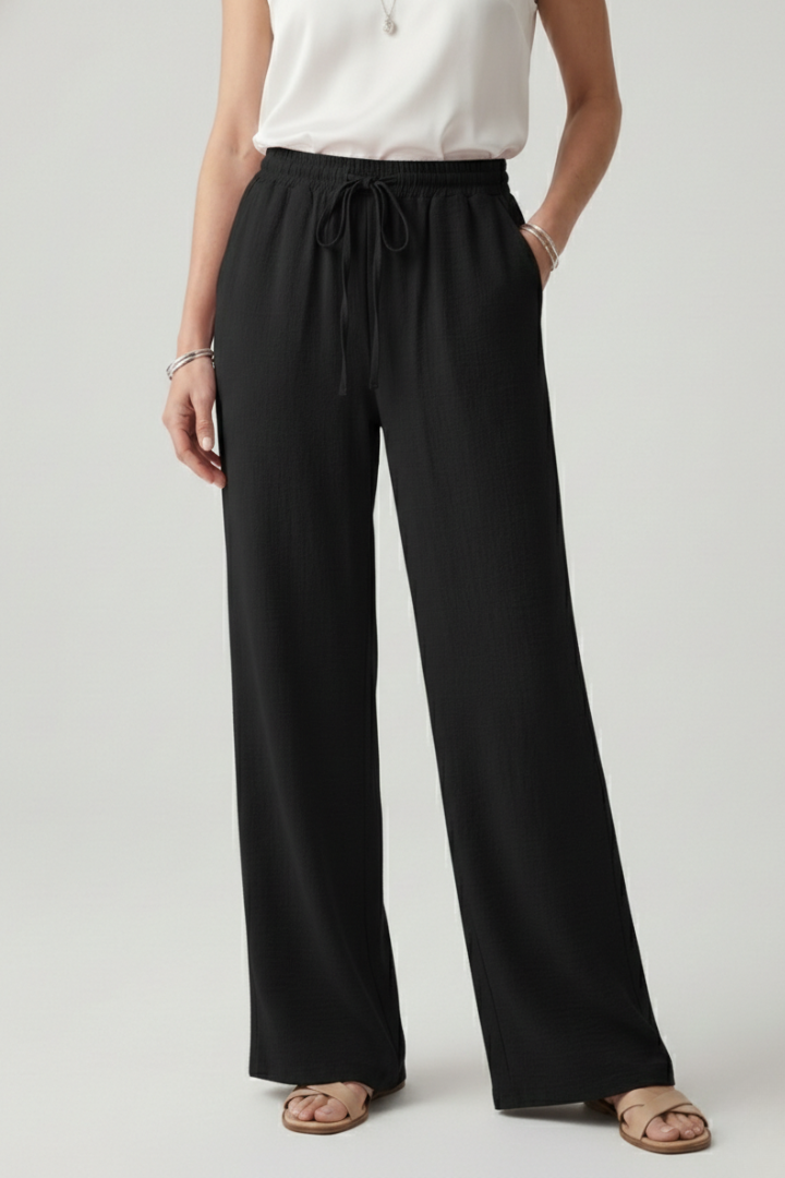 Everyday women's casual palazzo trousers, wide leg, drawstring waist. Relaxed fit for ultimate comfort.