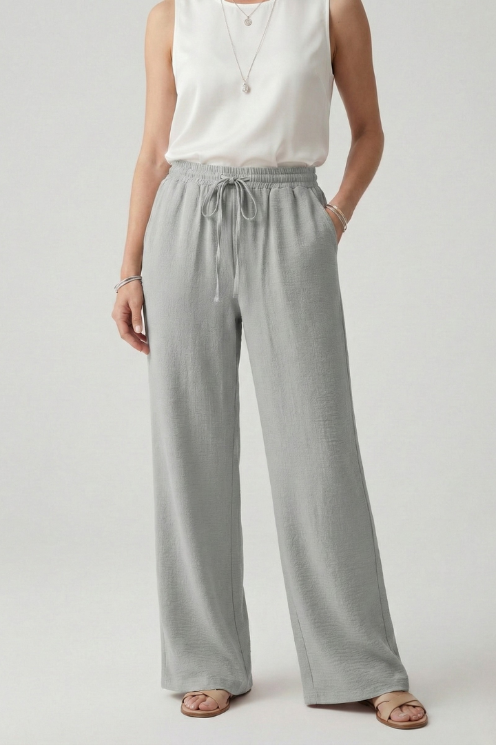 Women's wide leg palazzo pants with drawstring waist. Casual, comfy, and perfect for summer everyday wear.