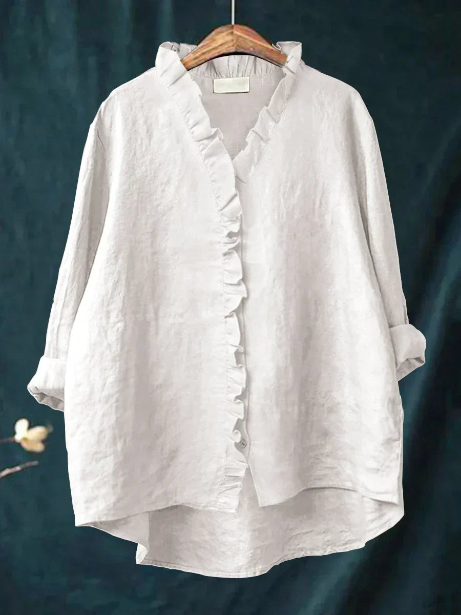 Chic & comfortable women's relaxed fit blouse with ruffle V-neck & long sleeves.