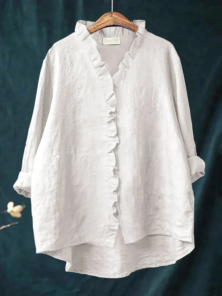 Chic & comfortable women's relaxed fit blouse with ruffle V-neck & long sleeves.
