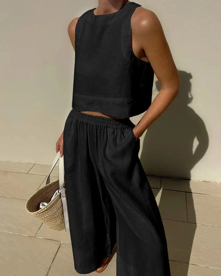 Stylish women's sleeveless top and capri pants set. Versatile casual outfit for summer & travel.