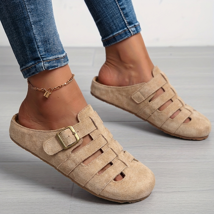 Stylish women's open-toe slip-on mule sandals, perfect casual flats for easy summer wear and comfort.