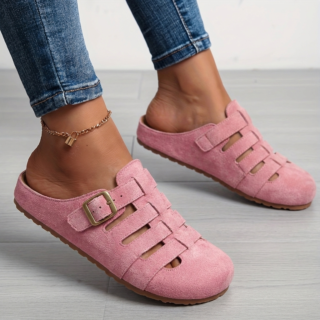 Stylish women's open-toe mule sandals in a casual slip-on design for ultimate summer comfort and everyday wear.