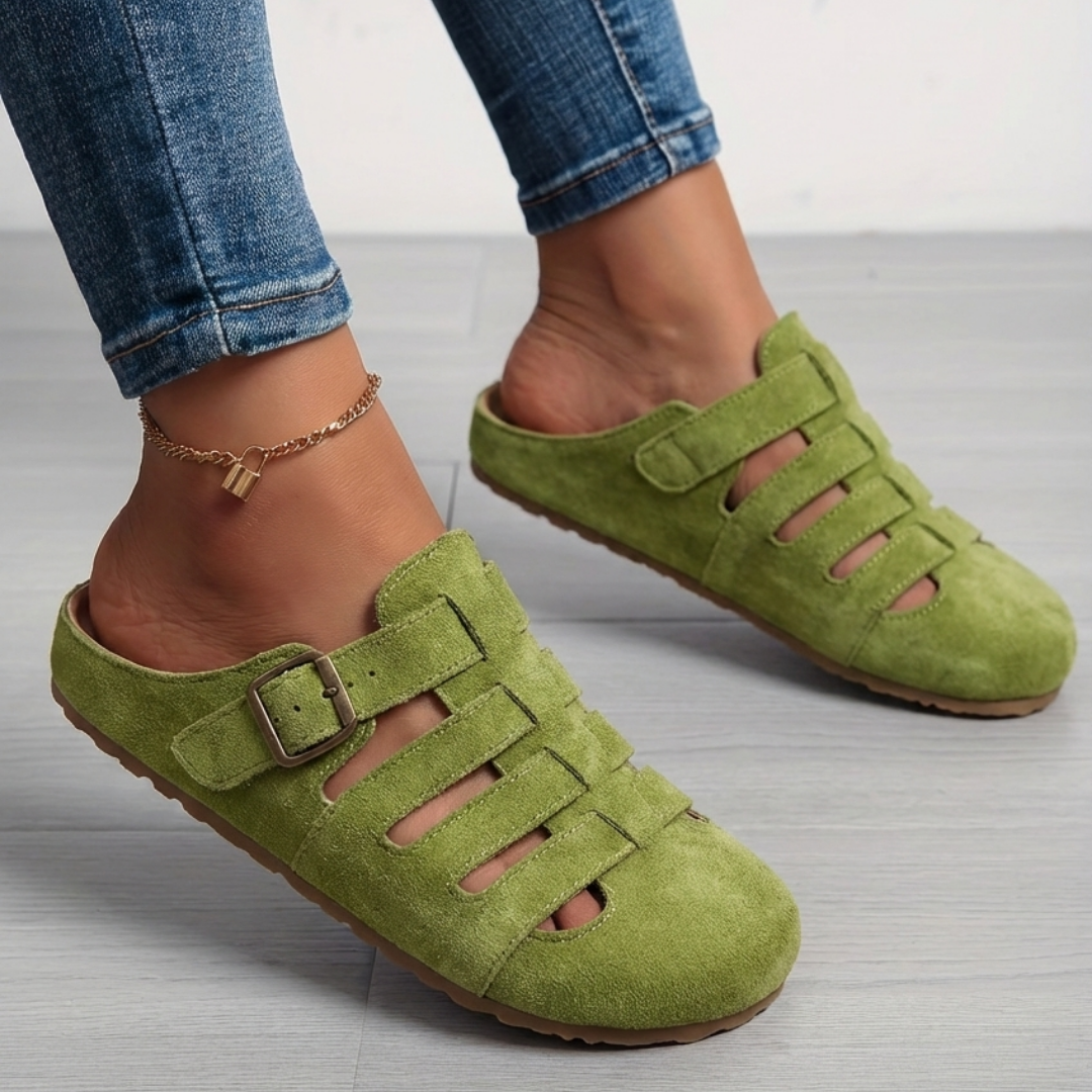 Lightweight women's comfort mule sandals with a slip-on design, featuring open toe and durable casual sole.
