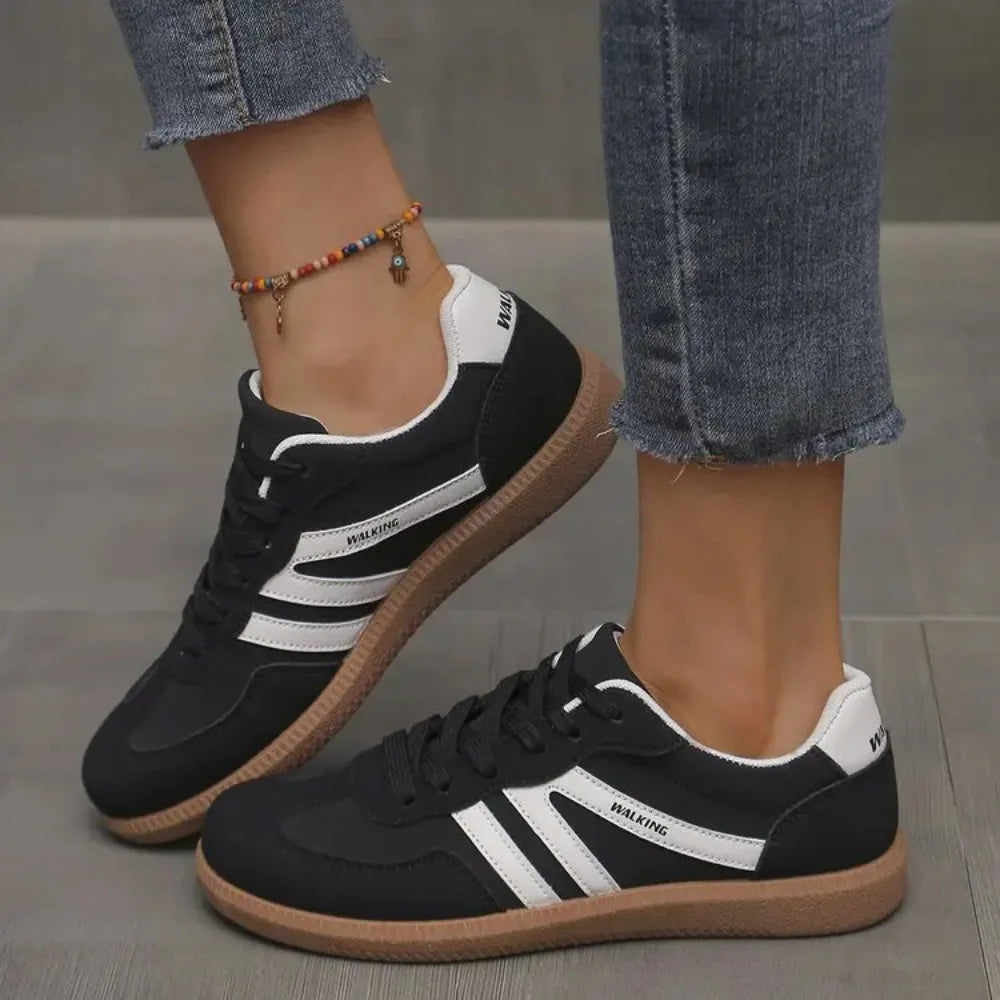 Women's casual sneakers with iconic classic style. Comfortable lace-up fashion footwear perfect for everyday wear.