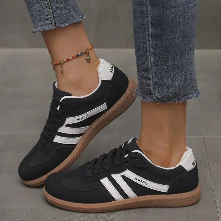 Women's casual sneakers with iconic classic style. Comfortable lace-up fashion footwear perfect for everyday wear.