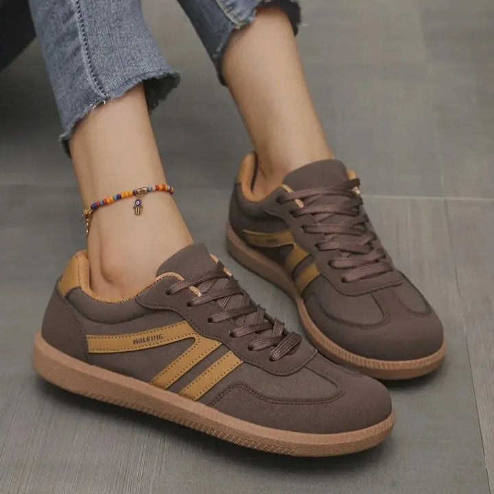 Iconic women's casual sneakers offering comfortable everyday footwear. Classic lace-up design for versatile style.