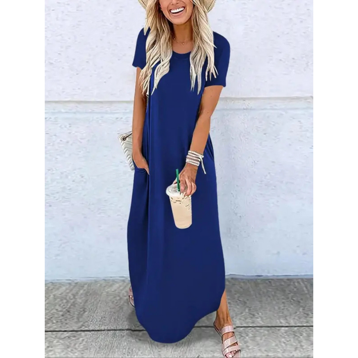 Stylish women's summer maxi dress, round neck, short sleeve, side pockets. Loose fit for comfortable everyday fashion.