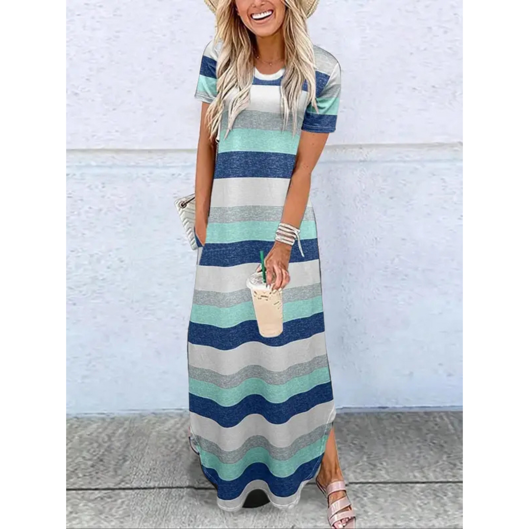 Elegant women's summer maxi dress with round neck and practical side pockets. Loose fit, comfortable, and versatile.