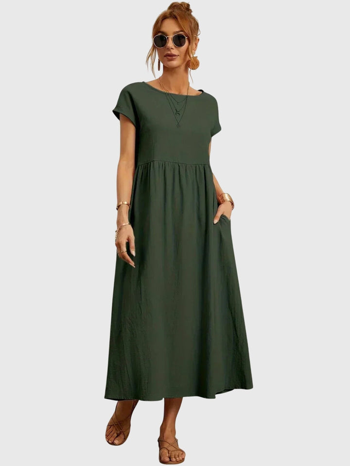 Women's casual t-shirt dress with pockets, perfect for everyday comfort and relaxed summer wear.