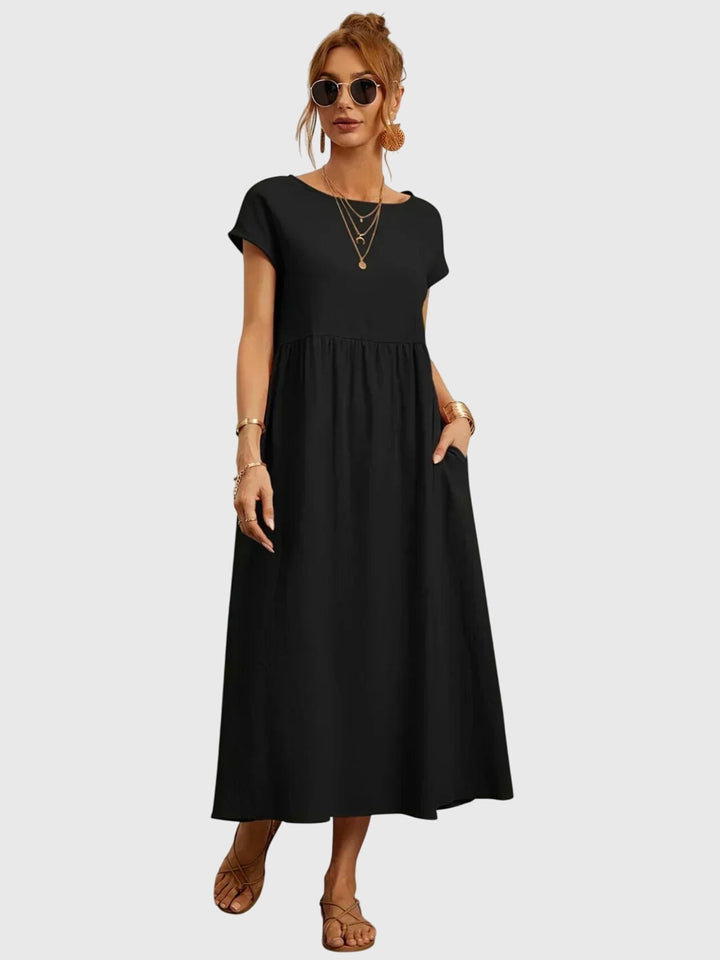 Comfortable women's t-shirt dress featuring convenient side pockets, ideal for daily relaxed styling.