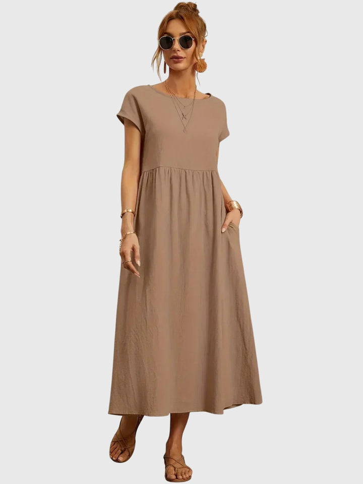 Relaxed fit women's casual t-shirt dress, an easy-wear summer design offering ultimate comfort and fashion.