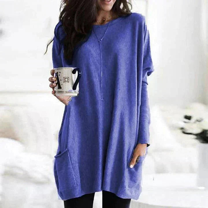 Comfortable women's relaxed fit tee with practical pockets for everyday versatile wear.