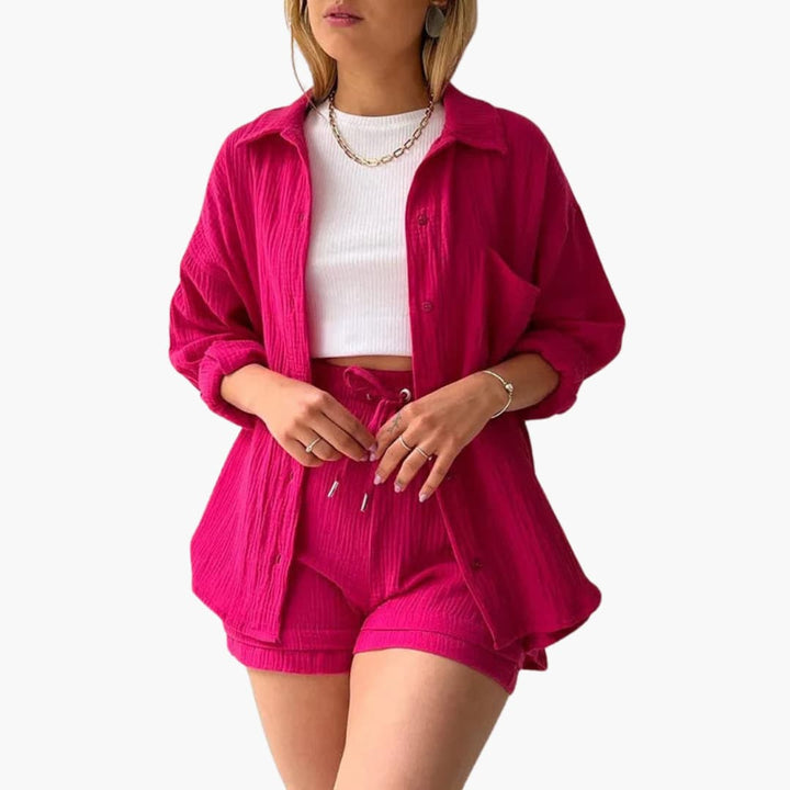 Modern women's three-piece ensemble: button-up shirt, trendy crop top & comfortable high-waist shorts.