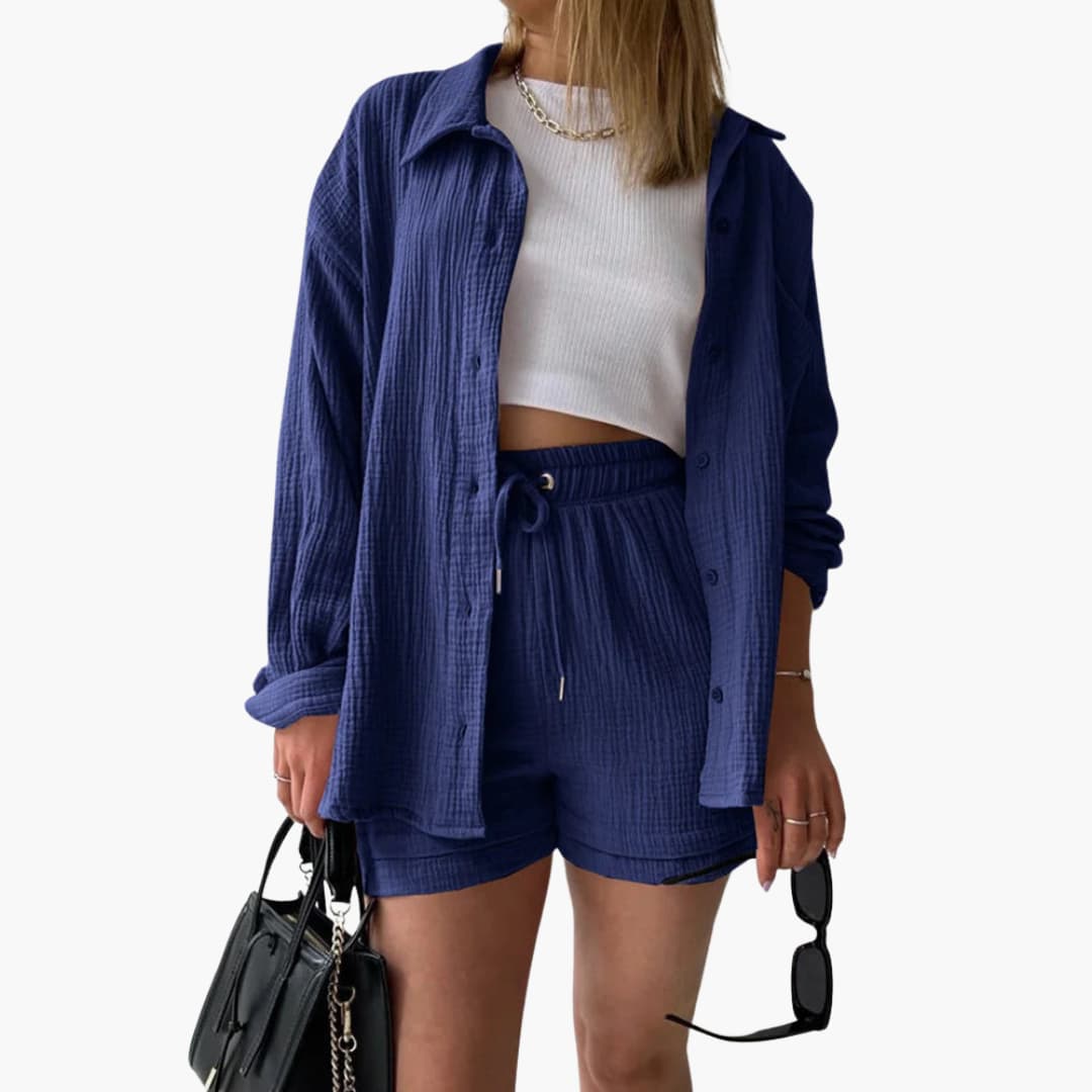 Versatile women's three-piece outfit: long-sleeve shirt, fitted crop top, and flowy high-waist shorts.